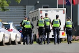 Police outside Melbourne Youth Justice Centre at Parkville