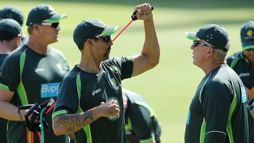 Mitchell Johnson warms up for net session