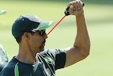 Mitchell Johnson warms up for net session