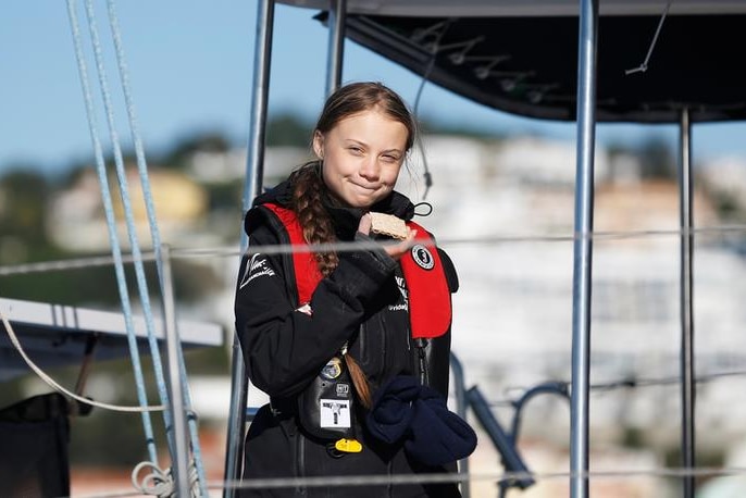 Climate change activist Greta Thunberg arrives aboard the yacht La Vagabonde at Santo Amaro port in Lisbon, Portugal.
