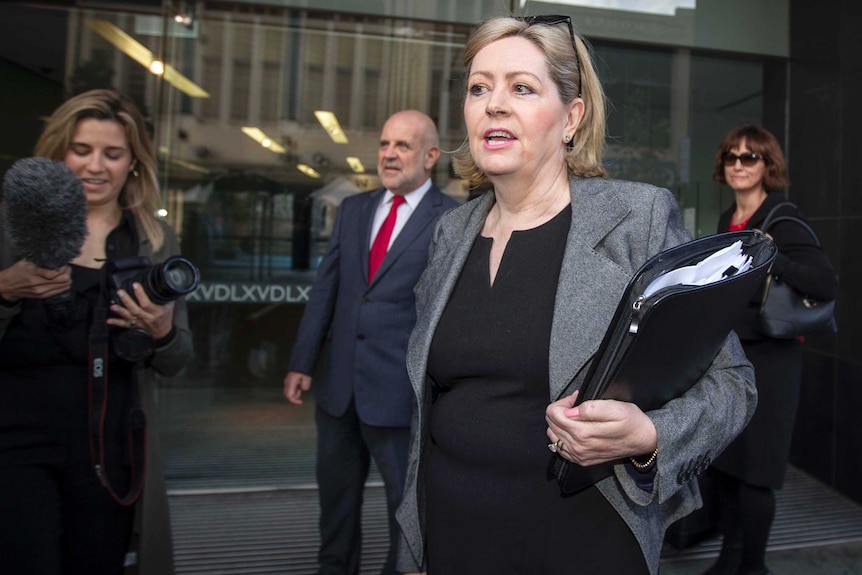 Perth Lord Mayor, Lisa Scaffidi talks to reporters outside the State Administrative Tribunal in Perth.