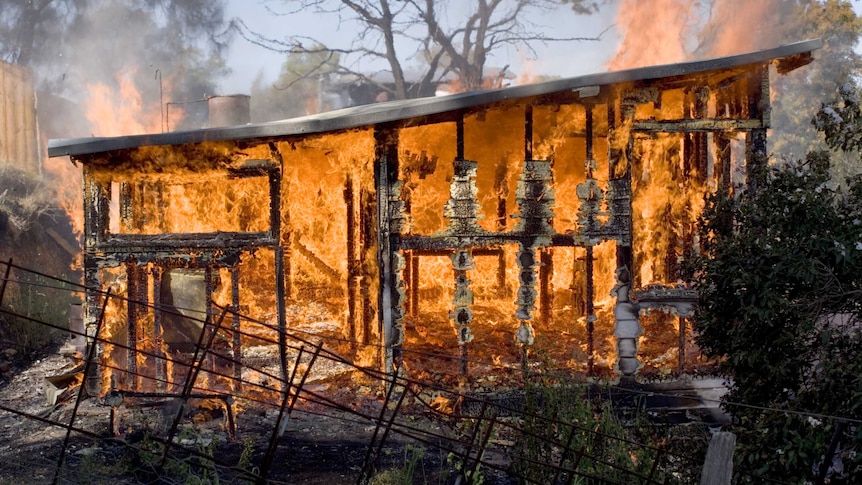 House engulfed in flames