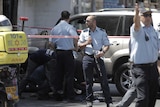 Israeli police seal off the scene of a car attack in east Jerusalem