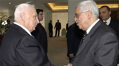 Ariel Sharon and Mahmoud Abbas (File photo)
