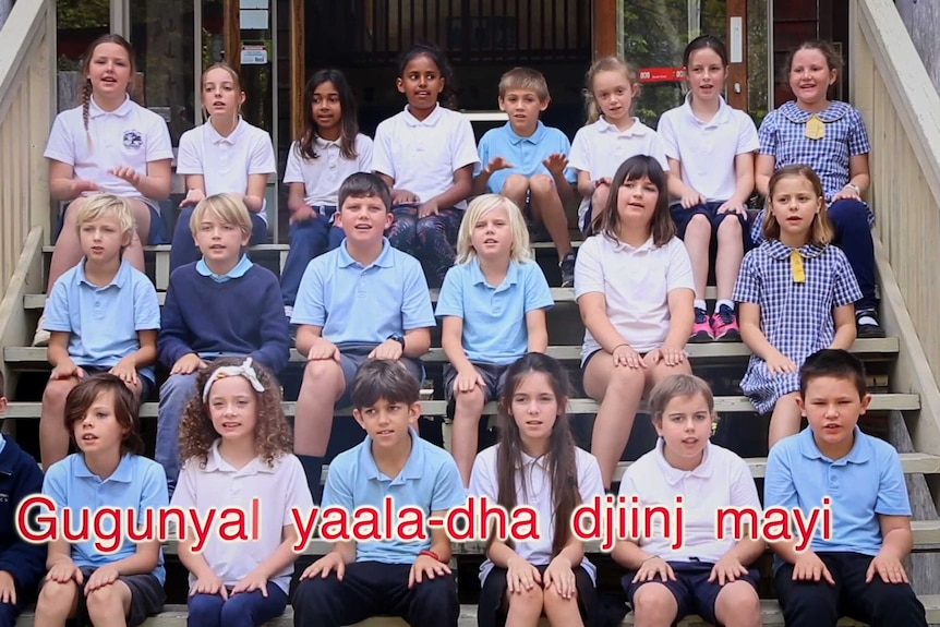 Children sing Kookaburra sits in the old gum tree in language