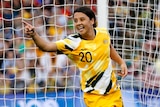 Soccer player celebrates after scoring a goal during a match