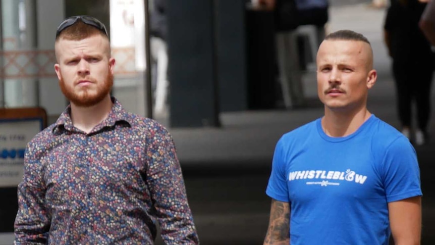 James Warden and co-accused Arkadiusz Swiebodzinski stand on a street corner in Perth as they return to trial.