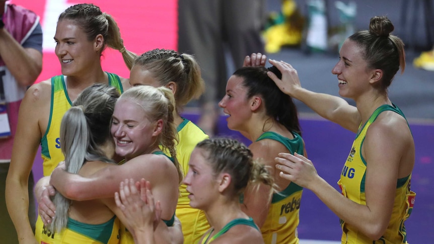 Australian players celebrate after the match