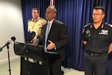 Adam Giles (centre) at the press conference following the Four Corners Don Dale report.