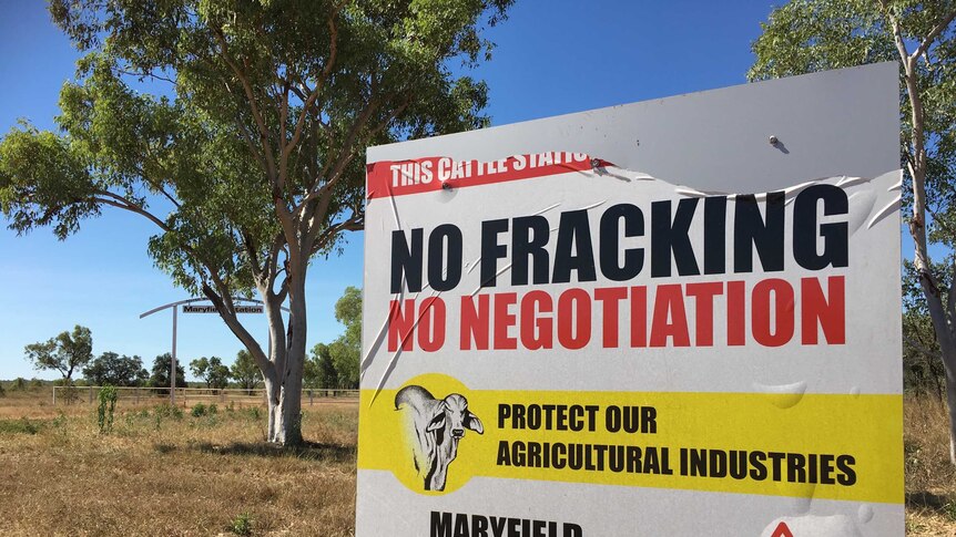 A sign reads "no fracking, no negotiation"