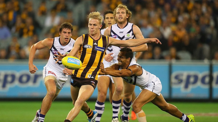 Will Langford kicks for Hawthorn