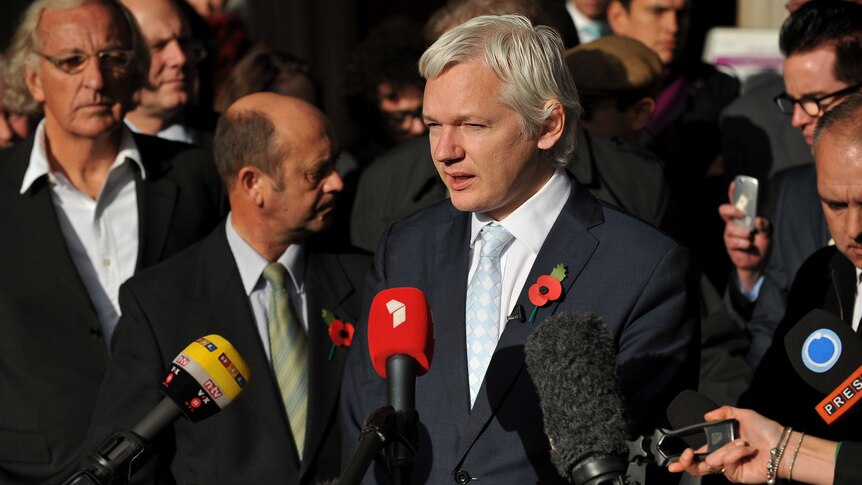 Julian Assange addresses media (AFP: Ben Stansall)