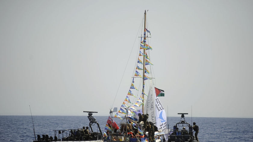 Israeli soldiers boarding a Gaza-bound yacht