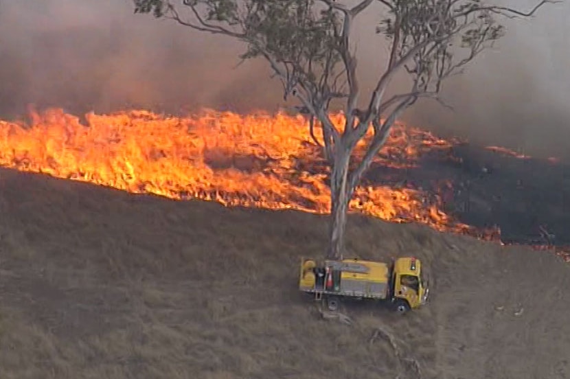 Rural firefighter truck near bushfire at Laidley.