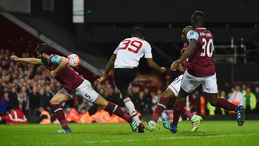 Marcus Rashford scores for Manchester United against West Ham in FA Cup quarter-final replay.