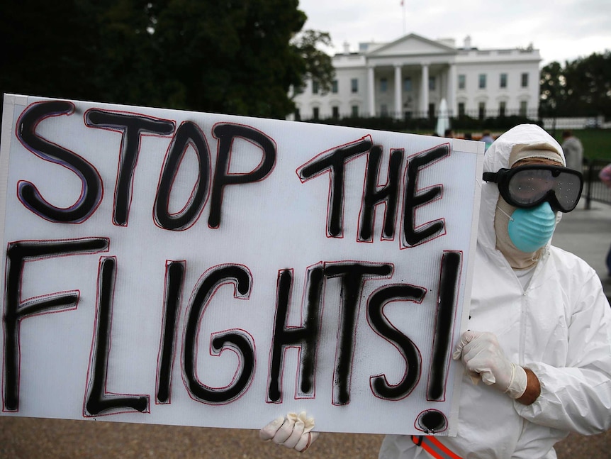 Protester demands US ban travel to prevent Ebola