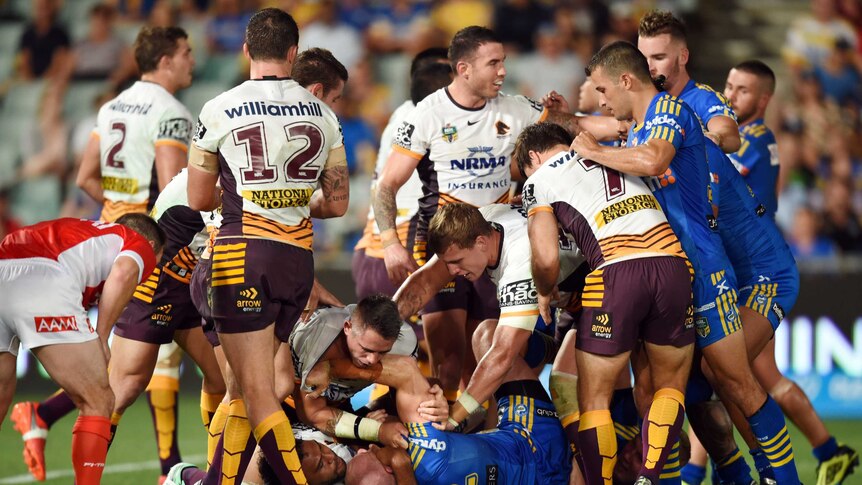 Heated moment ... The Eels and Broncos clash during the NRL season opener