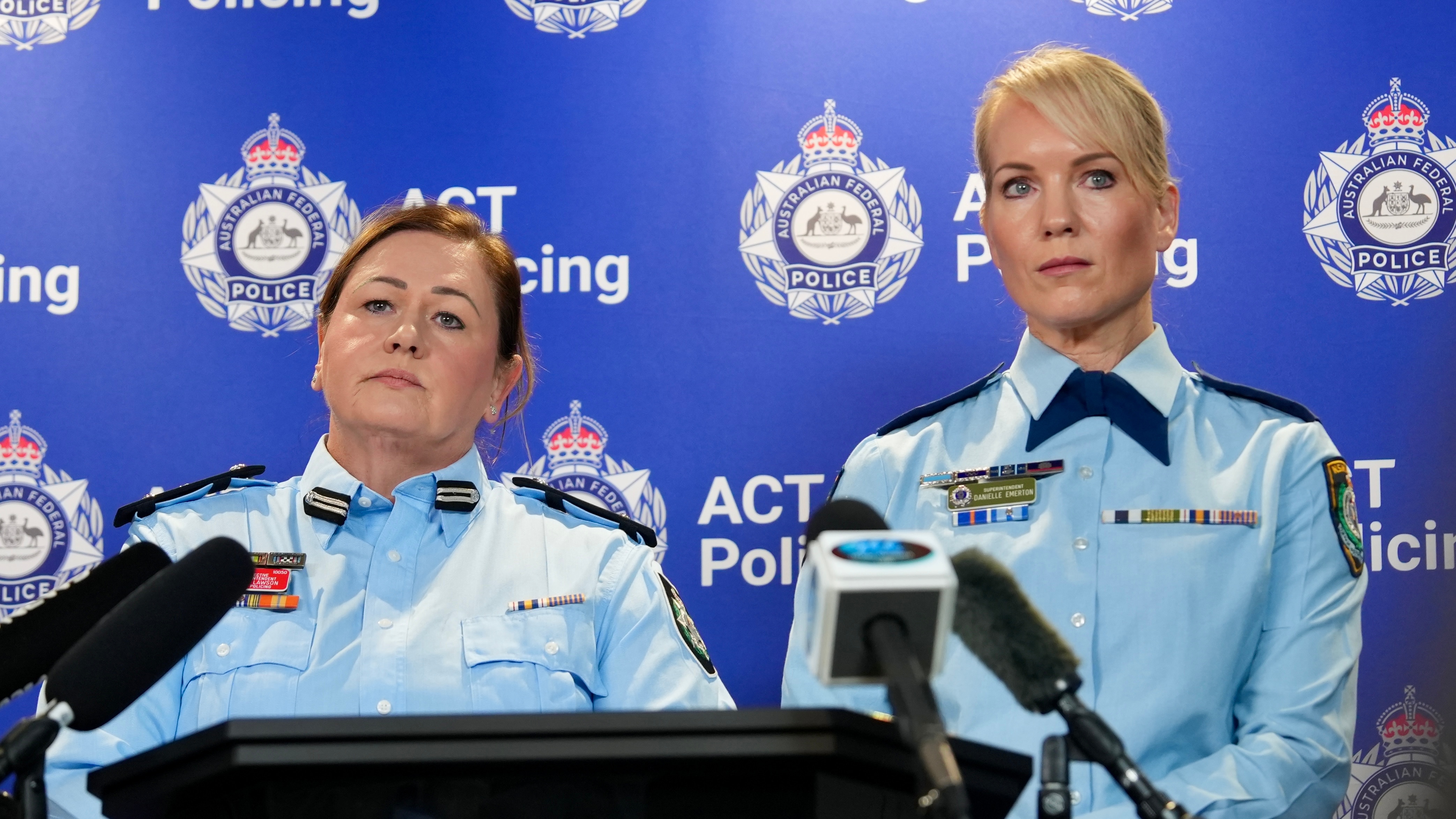 A close up photo of Supt Danielle Emerton at a press conference, AFP insignia behind her