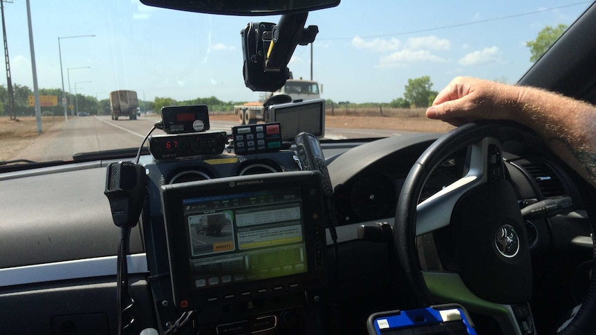 An Automatic Number Plate Recognition system on the the dashboard of an NT Police patrol car.