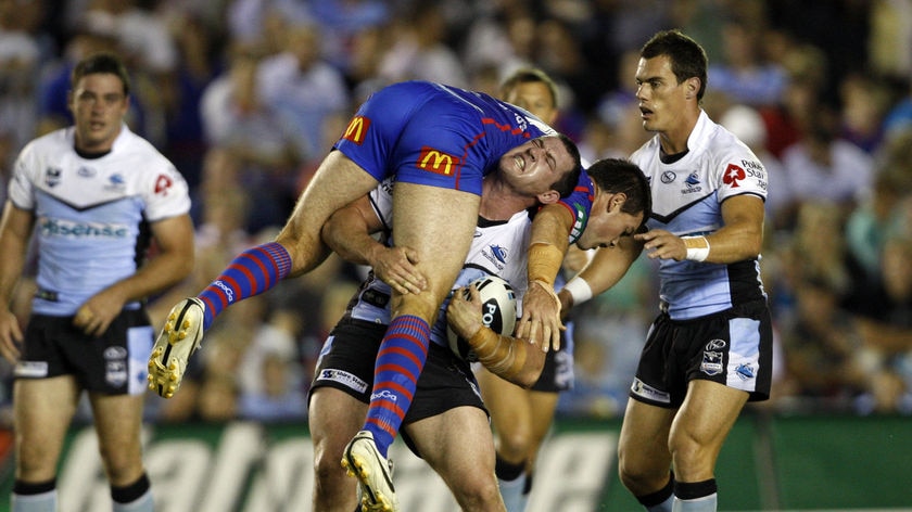 Crunching defence...Cronulla's Tim Smith attributed the Sharks' win to their forward pack, including Paul Gallen.
