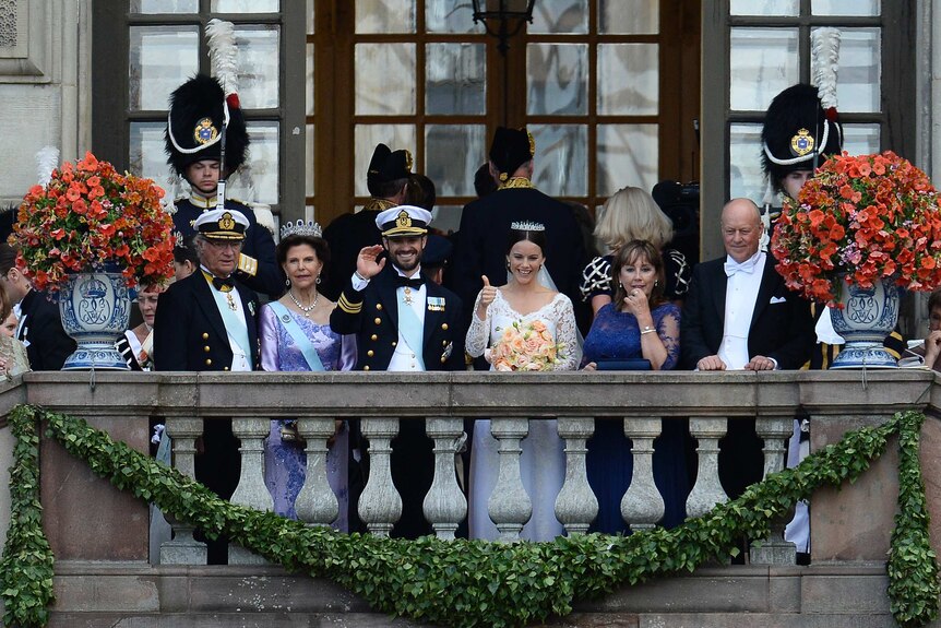 Sweden's Prince Carl Philip and Sofia Hellqvist with their families at Stockholm Palace