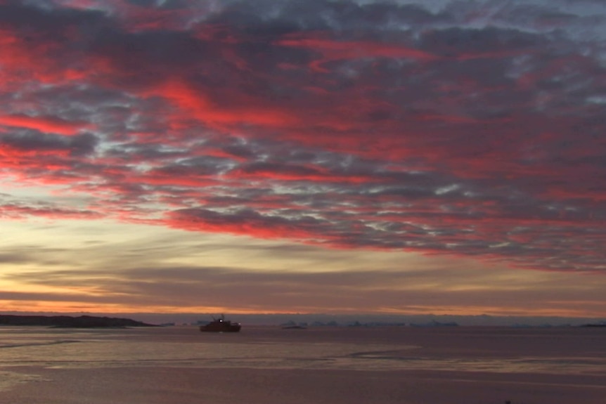 Aurora Australis under a red sky