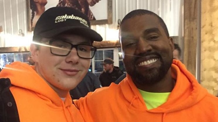 Kanye West with a fan
