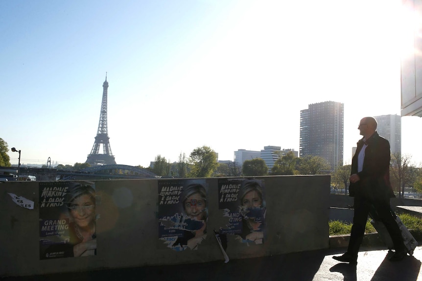 A campaign poster of Marine Le Pen in Eiffel Tower in Paris.