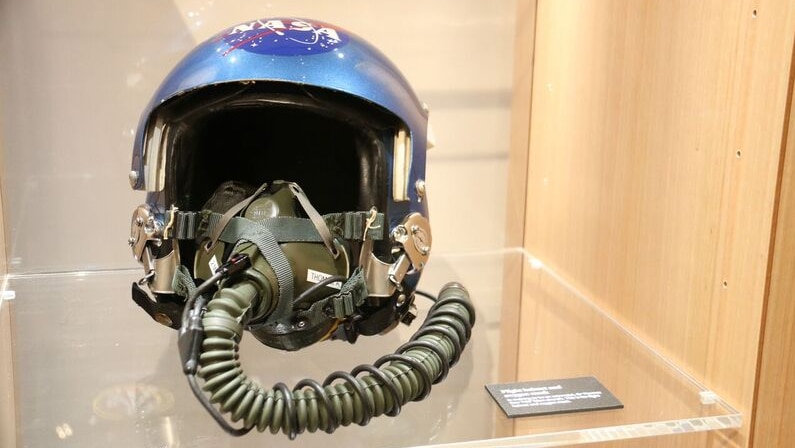 A NASA space helmet on display.