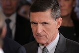 Michael Flynn arrives at a news conference