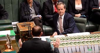 Bill Shorten listens to Tony Abbott