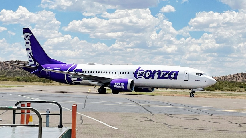 A bonza aircraft on a runway