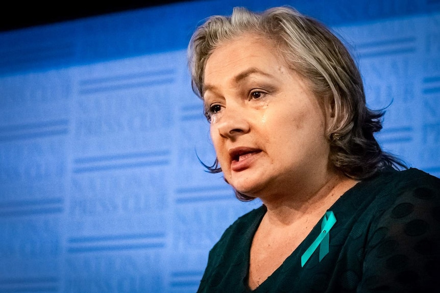 ABC Newcastle Mornings presenter Jill Emberson is crying while speaking at the National Press Club.