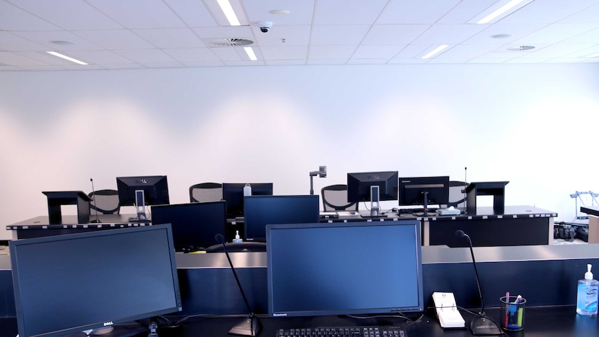 Computers and tables in a CCC hearing room