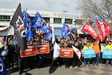 Crowds rally against China free trade deal in Canberra