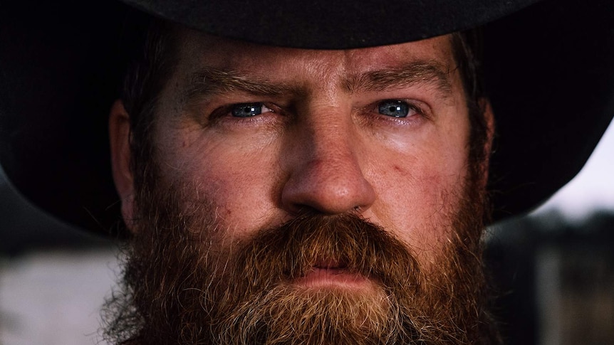 Close up portrait of Farmer Jade Corby who lost his home in the bushfires.