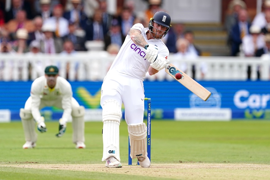 Ben Stokes watches the ball onto the middle of his bat as he plays a pull shot