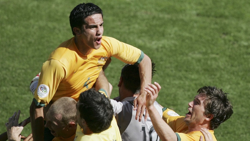 Tim Cahill celebrates goal against Japan