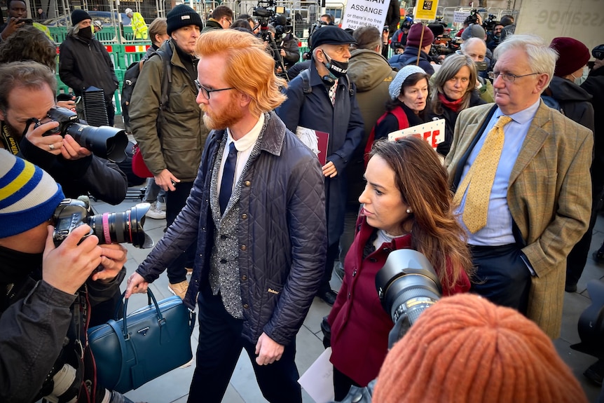 Stella Moris is photographed outside the Royal Courts of Justice in London.