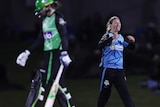 A bowler celebrates getting a batter out.