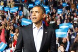Barack Obama arrives on stage at an election campaign rally in Columbus, Ohio, November 5, 2012.