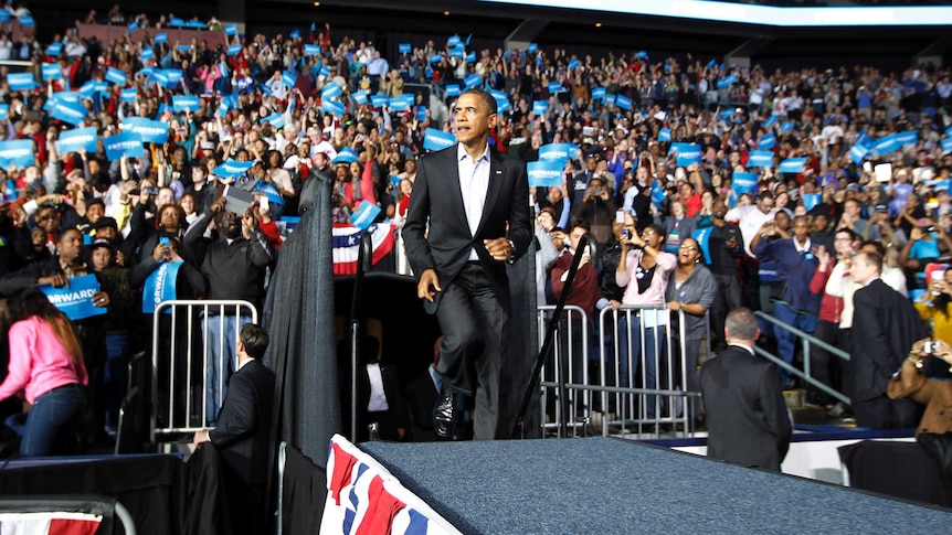 Barack Obama arrives on stage at an election campaign rally in Columbus, Ohio, November 5, 2012.