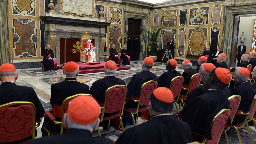 Pope Benedict XVI delivering a speech to cardinals on his last day as pontiff