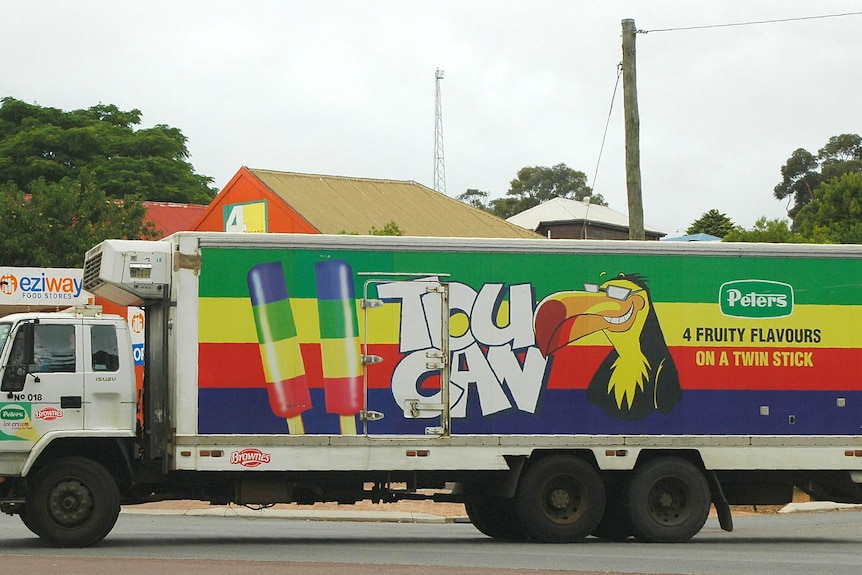 A truck advertising toucan icy poles