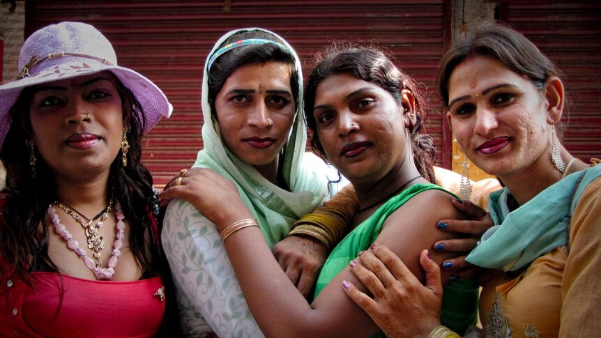 A group of hijras in Laxman Jhula in bright clothing