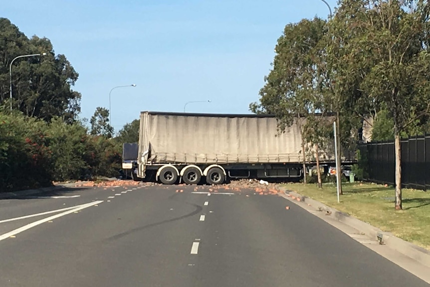 side shot of truck at the crash site