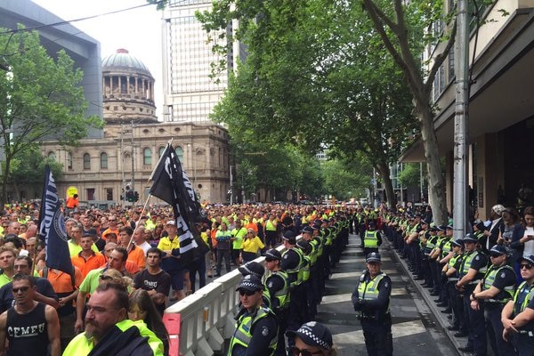 Police gather outside Melbourne Magistrate's Court