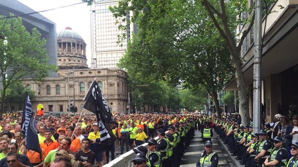 Police gather outside Melbourne Magistrate's Court