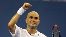 Too good ... Andre Agassi went through in five sets against Marcos Baghdatis. (File photo)
