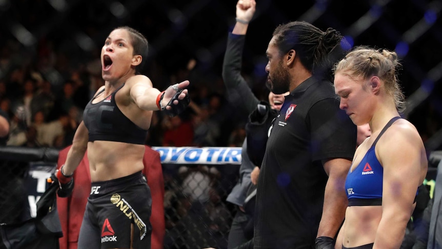Ronda Rousey's UFC return ends inside a minute as Amanda Nunes keeps  bantamweight crown with TKO - ABC News